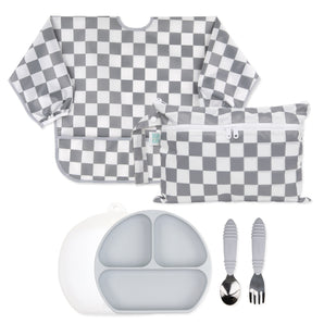 Bumkins On-The-Go Mealtime 6-Piece Set: Charcoal Check + Grey—a waterproof bib & matching pouch, silicone plate, lid, and toddler utensils.