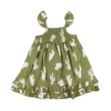 Organic Smocked Dress, Sage Cactus: green dress with white cactus print, ruffle hem & straps; made of 100% organic cotton.