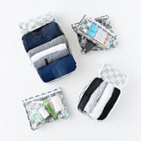 Bumkins The Outfit Organizer Essential 5-Piece Set: Charcoal Check holds clothes and toiletries on a white background.