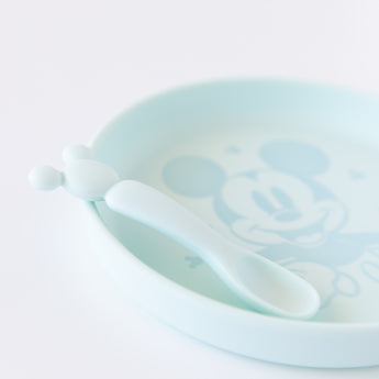 Close-up of Bumkins Silicone Plate + Spoon Set: Disney Mickey Mouse on a white background.