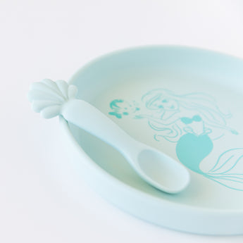Close-up of Bumkins Silicone Plate + Spoon Set: Disney Princess Ariel on a white background.