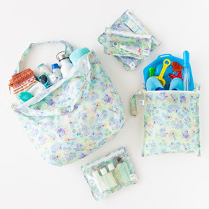 Bumkins The Playdate Planner Deluxe 5-Piece Set: Aloha Stitch holds toiletries and beach gear on a white background.
