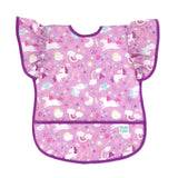 Bumkins Ruffle Apron Bib: Unicorns features purple waterproof fabric with a unicorn pattern, ruffle sleeves, purple trim, and front pocket.