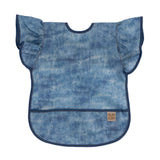 Bumkins Ruffle Apron Bib: Crushed Denim features blue denim printed waterproof fabric, ruffle sleeves, dark blue trim, and front pocket.