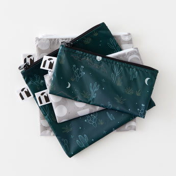 Roamio by Bumkins Reusable Snack Bag 4 Pack: Desert Night lays stacked on a white background.