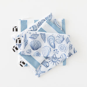 Roamio by Bumkins Snack Bag 4 Pack: Coastal lays stacked on a white background.