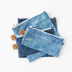 Roamio by Bumkins Snack Bag 4 Pack: Denim On Denim lays stacked on a white background.