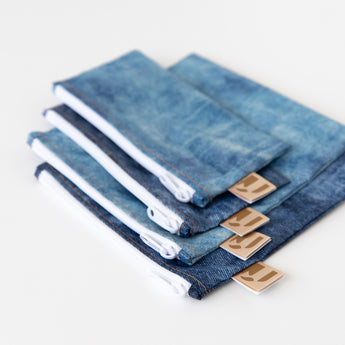 Roamio by Bumkins Snack Bag 4 Pack: Denim On Denim is neatly stacked on a white background.