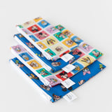 Bumkins Snack Bag 4 Pack: Mickey & Friends Excellent Eight is neatly stacked on a white background.
