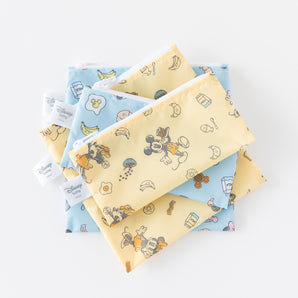 Bumkins Snack Bag 4 Pack: Mickey + Minnie Mouse Brunch Bunch lays stacked on a white background.