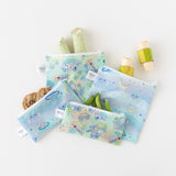 Bumkins Snack Bag 4 Pack: Stitch Star-ring Up Trouble, filled with snacks, lays overlapped on a white background.