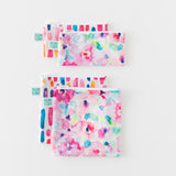 Four Bumkins Reusable Snack Bags in Watercolor & Brushstrokes patterns, sold as a 4 pack, shown on a white background.