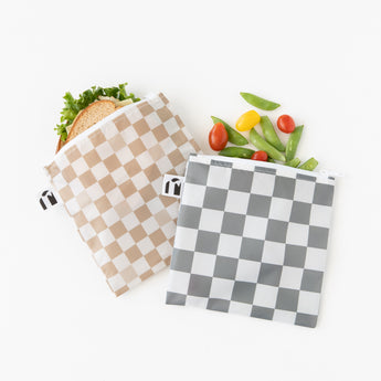 Roamio by Bumkins Bumkins Reusable Snack Bag, Large 2 Pack: Double Check holds a sandwich and veggies on a white background.
