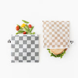 Roamio by Bumkins Bumkins Reusable Snack Bag, Large 2 Pack: Double Check holds a sandwich and veggies on a white background.