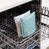 Bumkins Reusable Snack Bag, Large 2 Pack: Desert Night sits in the top rack of an open dishwasher.