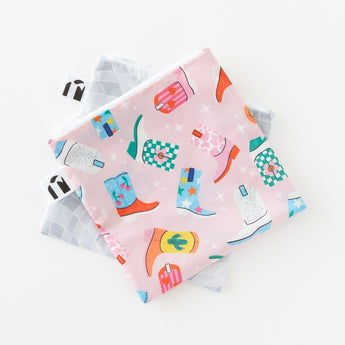Bags from Bumkins Snack In Style 3-Piece Set: Disco Boots lay stacked on a white background.