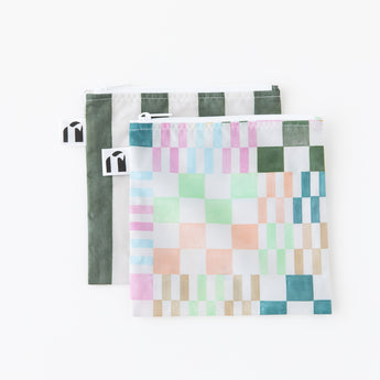Roamio by Bumkins Reusable Snack Bag, Large 2 Pack: Motley Club lays overlapped on a white background.