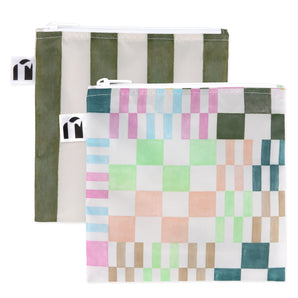Roamio by Bumkins Reusable Snack Bag, Large 2 Pack: Motley Club—2 waterproof pouches, one with green & white stripes, one with colorful squares.