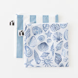 Roamio by Bumkins Reusable Snack Bag, Large 2 Pack: Coastal lays overlapped on a white background.