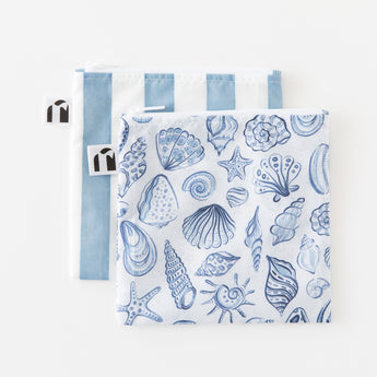 Roamio by Bumkins Reusable Snack Bag, Large 2 Pack: Coastal lays overlapped on a white background.