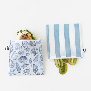 Roamio by Bumkins Reusable Snack Bag, Large 2 Pack: Coastal holds a sandwich and kiwi halves on a white background.