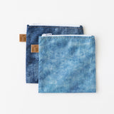Roamio by Bumkins Reusable Snack Bag, Large 2 Pack: Denim on Denim lays overlapped on a white background.