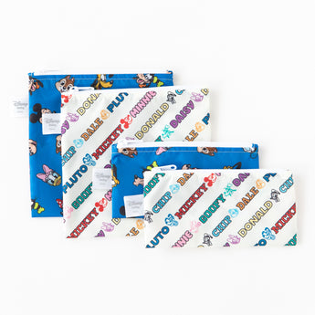 Bumkins Reusable Snack Bag, Large 2 Pack: Mickey & Friends MVP are shown on a white background with other bags from the collection.