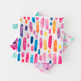 Two bags from Bumkins Reusable Snack Bag 4 Pack: Watercolor and Brushstrokes lay stacked on a white background.