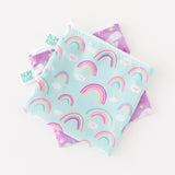 Bags from Bumkins Snack In Style 3-Piece Set: Unicorns and Rainbows lay stacked on a white background.