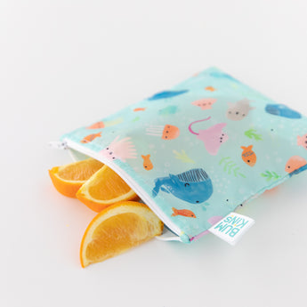Bumkins Reusable Snack Bag, Large 2-Pack—Ocean Life & Whale Tail designs, with durable zippers and ocean animal prints.
