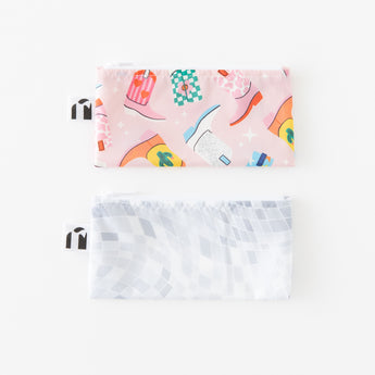 Roamio by Bumkins Reusable Snack Bag, Small 2 Pack: Disco Boots is neatly arranged on a white background.
