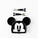 A plate and toddler utensils from Bumkins On-The-Go Mealtime 7-Piece Set: Mickey & Friends MVP rest on a white background.