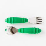 Bumkins Spoon + Fork: Jade are neatly arranged on a white background.