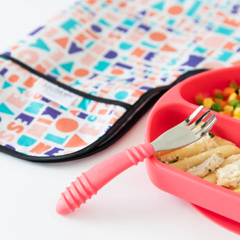 Childrens food-safe silicone plate with pasta, geometric bib, and Bumkins toddler-friendly Spoon + Fork: Red.