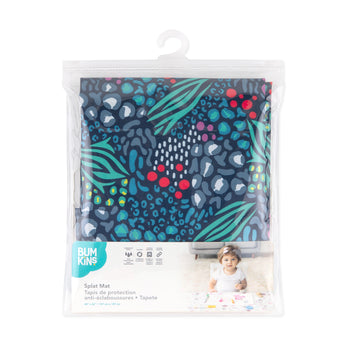 Bumkins Splat Mat: Animal Prints is shown folded in plastic packaging bag with a hanger and cardboard insert.