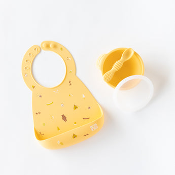 Bumkins Silicone Feeding 4-Piece Set: Pineapple is arranged on a white background.