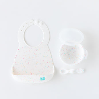 Bumkins Silicone Feeding 4-Piece Set: Vanilla Sprinkle is neatly arranged on a white background.