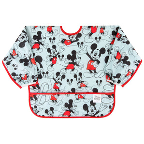 Bumkins Sleeved Bib: Mickey Mouse features a blue waterproof bib with Mickey Mouse illustrations, front pocket, and red trim.