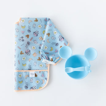 Bumkins On-The-Go Mealtime 5-Piece Set: Mickey + Minnie Mouse Sunny Side Up Blue lays flat on a white background.