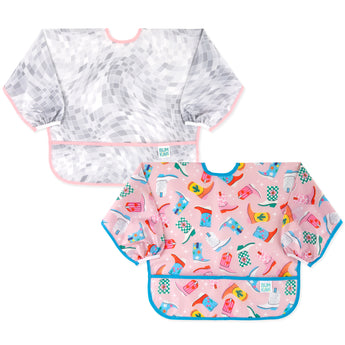 Bumkins Sleeved Bib 2 Pack: Disco Boots includes 2 waterproof bibs with front pockets—one pink with cowboy boots, one gray & white mosaic.