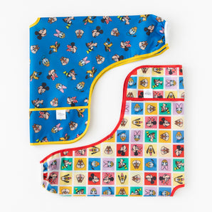 Bumkins Sleeved Bib 2 Pack: Mickey & Friends Excellent Eight lays folded on a white background.