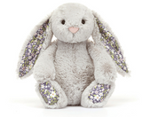 Meet Jellycats Blossom Bunny Silver: a gray plush with floral accents, sitting upright—the ideal nighttime companion.