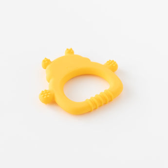 Silicone Flat Teether: Winnie the Pooh by Bumkins rests face down on a white background.