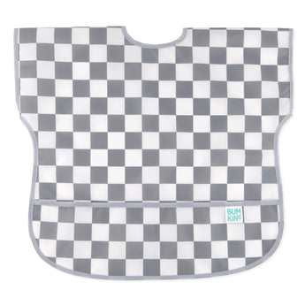 Bumkins Junior Bib: Charcoal Check features gray and white checkered, easy-wipe waterproof fabric, with pocket at the bottom.