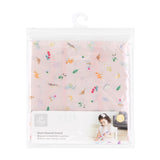 Bumkins Short-Sleeved Smock: Princess Magic is shown folded in a plastic packaging bag with a hanger and cardboard insert.