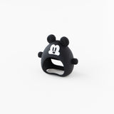 A teether from Bumkins On-The-Go Mealtime 5-Piece Set: Mickey + Minnie Mouse Sunny Side Up Pink sits on a white background.