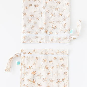 Bumkins Wet Bag + Wet/Dry Bag Set: Palm Daze is vertically arranged on a white background with only the top half of the bags visible.