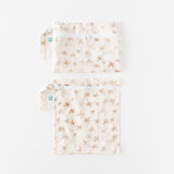 Bumkins Wet Bag + Wet/Dry Clutch Set: Palm Daze is arranged neatly on a white background.