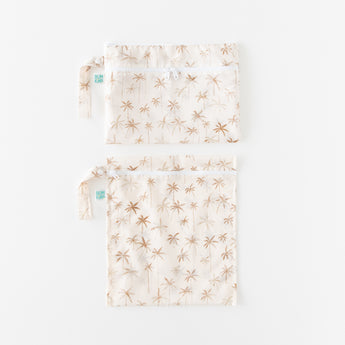 Bumkins Wet Bag + Wet/Dry Clutch Set: Palm Daze is arranged neatly on a white background.
