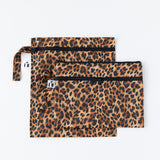 Roamio by Bumkins Wet Bag + Wet/Dry Clutch Set: Leopard lays overlapped on a white background.